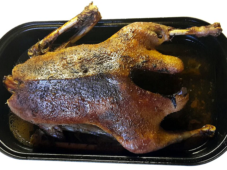 Roast Goose Lower Quarter (Leg) — signature food visual for Kam's Roast Goose