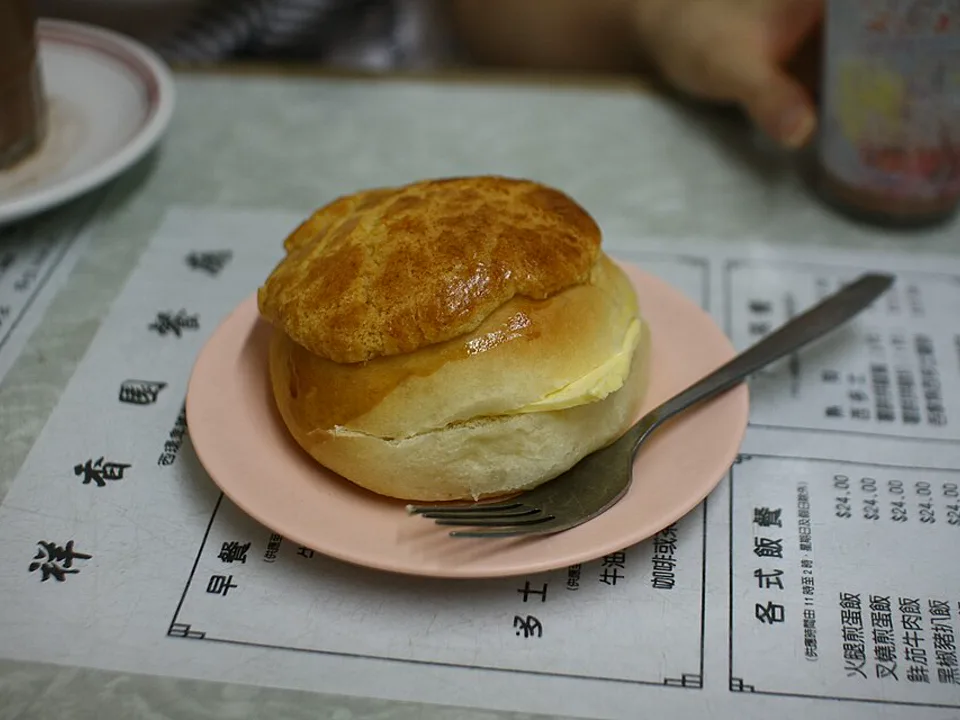 Pineapple Bun with Butter (菠蘿油) — signature food visual for Kam Wah Cafe & Cake Shop