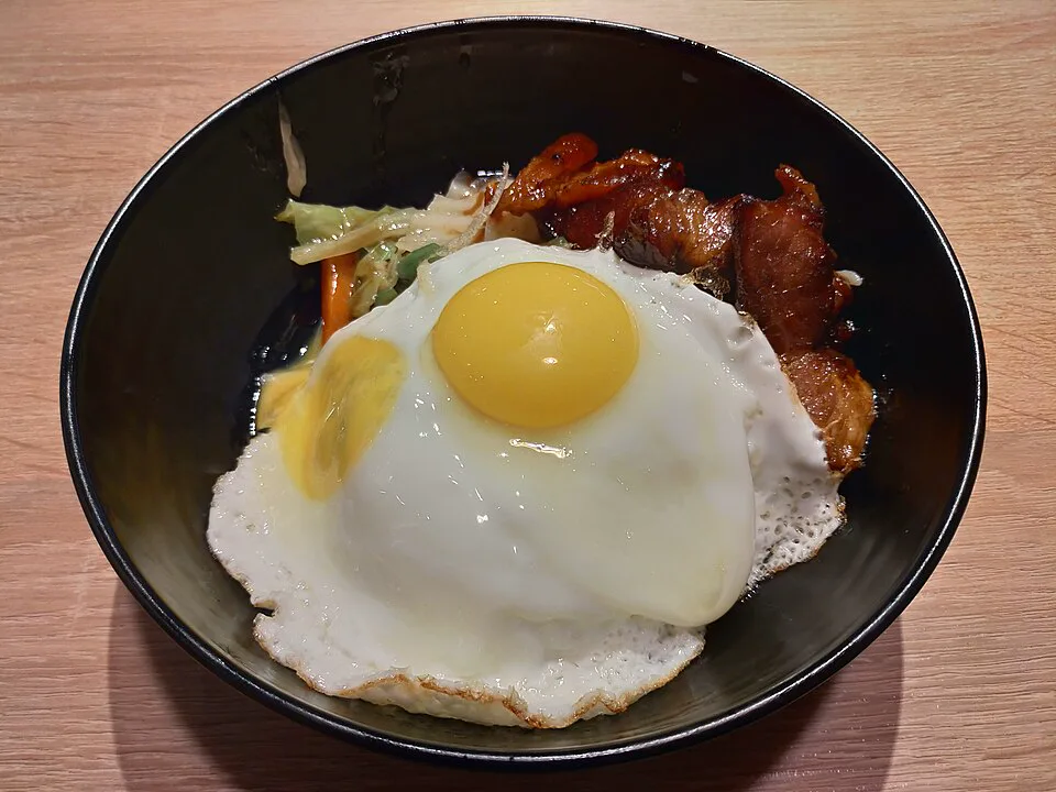 Men Wah Big Master Rice (BBQ Pork & Runny Fried Eggs on Rice) — signature food visual for Men Wah Bing Teng