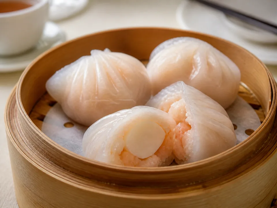 Steamed Scallop and Shrimp Dumpling — signature food visual for Yat Tung Heen