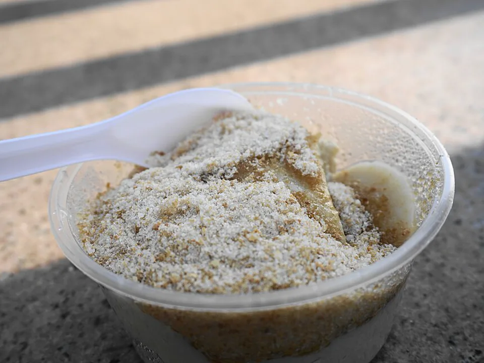Sweet Silken Tofu Pudding (豆腐花) with Yellow Cane Sugar — signature food visual for Kung Wo Beancurd Factory