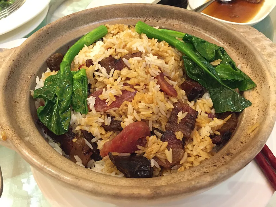 White Eel and Cured Lap Cheong Sausage Claypot Rice (白鱔臘腸煲仔飯) — signature food visual for Kwan Kee Claypot Rice
