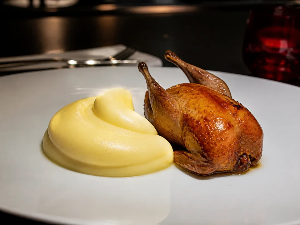 Legendary Butter Mashed Potatoes (Pomme Purée) — signature food visual for L'Atelier de Joël Robuchon