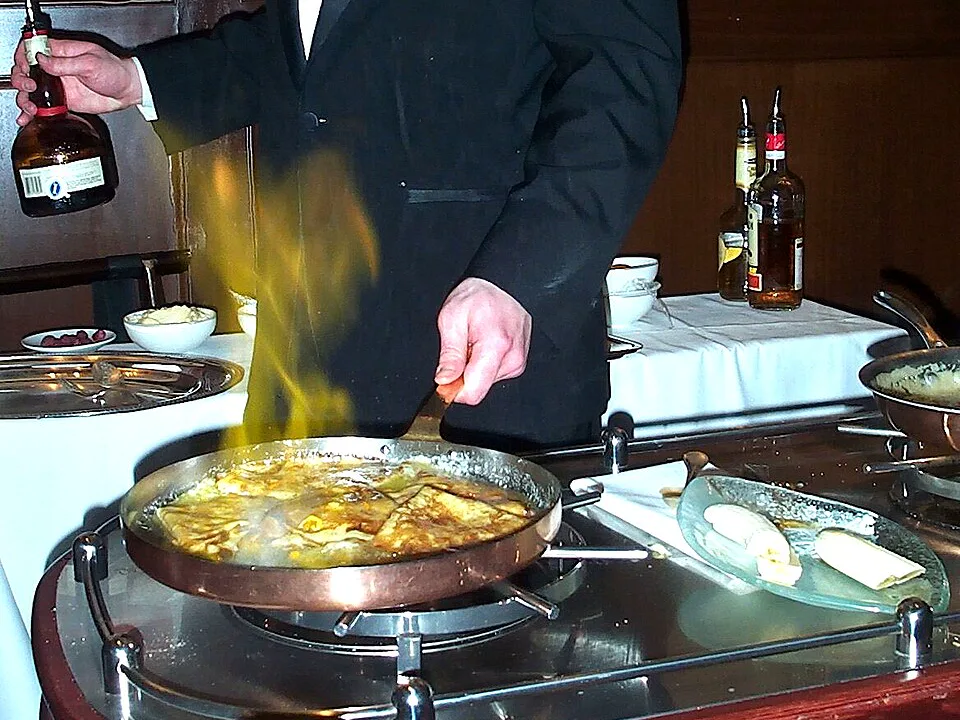 Tableside Crepes Suzette — signature food visual for Gaddi's